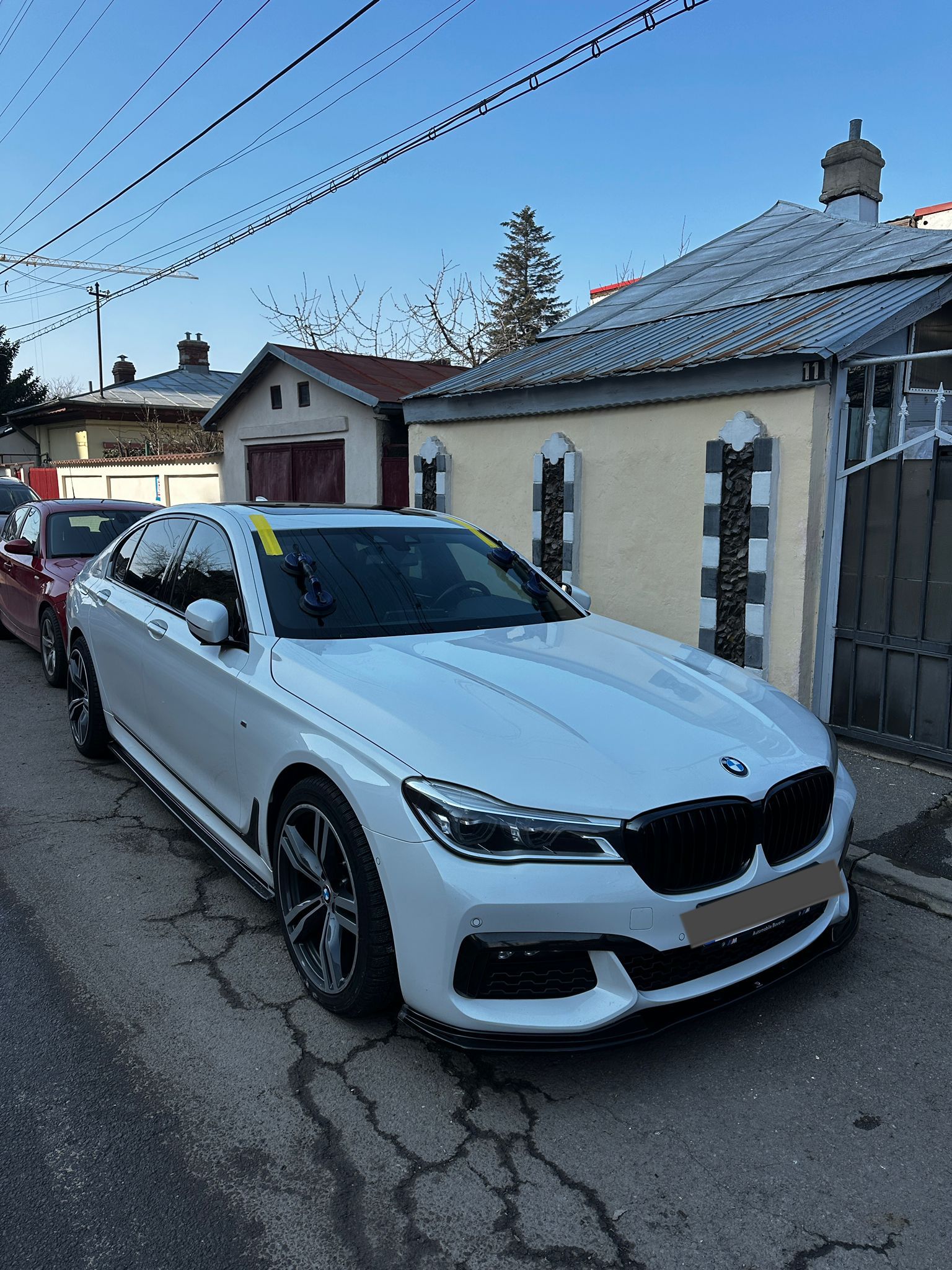 BMW 7 Series M-Sport — windshield, street